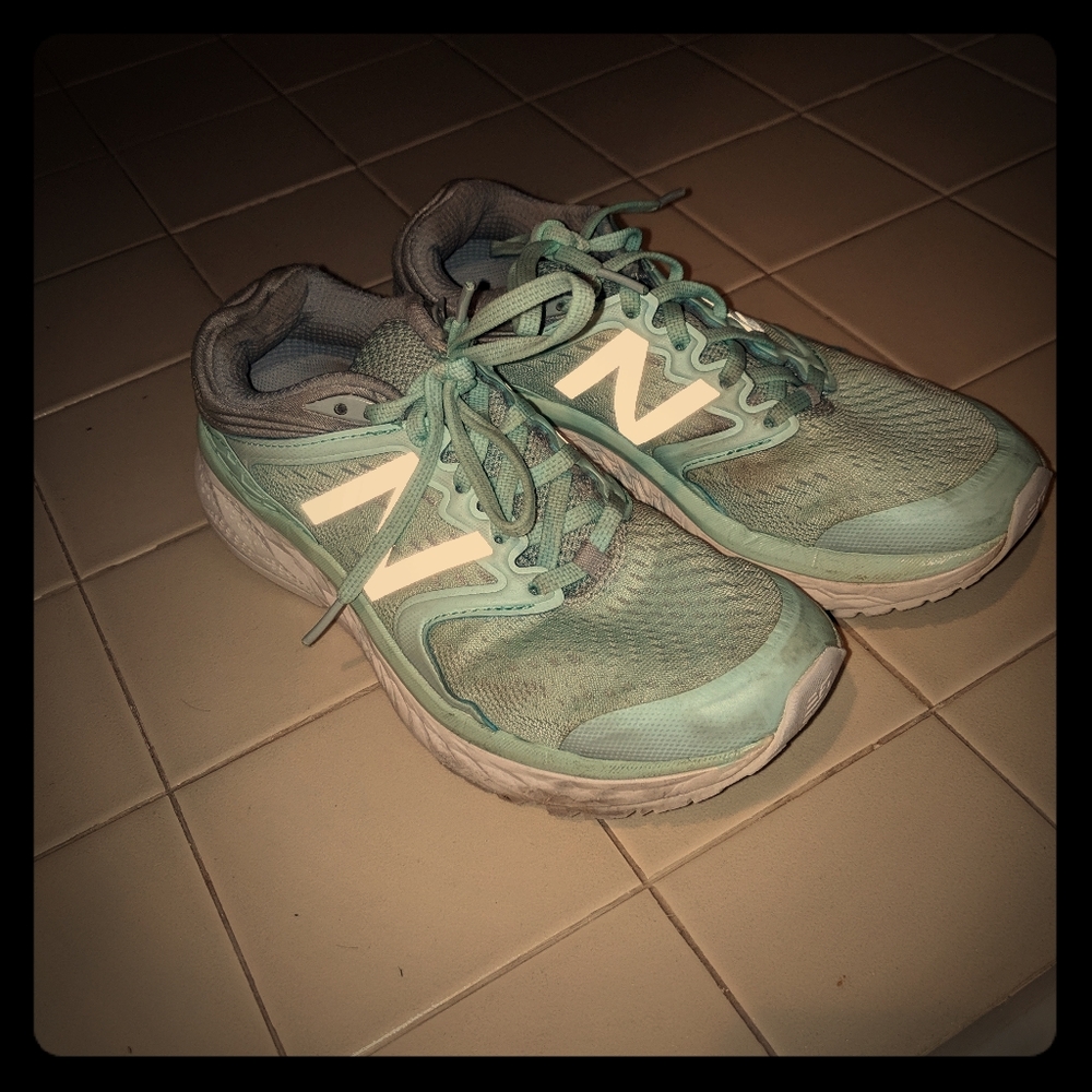 Mint green new balance running shoes